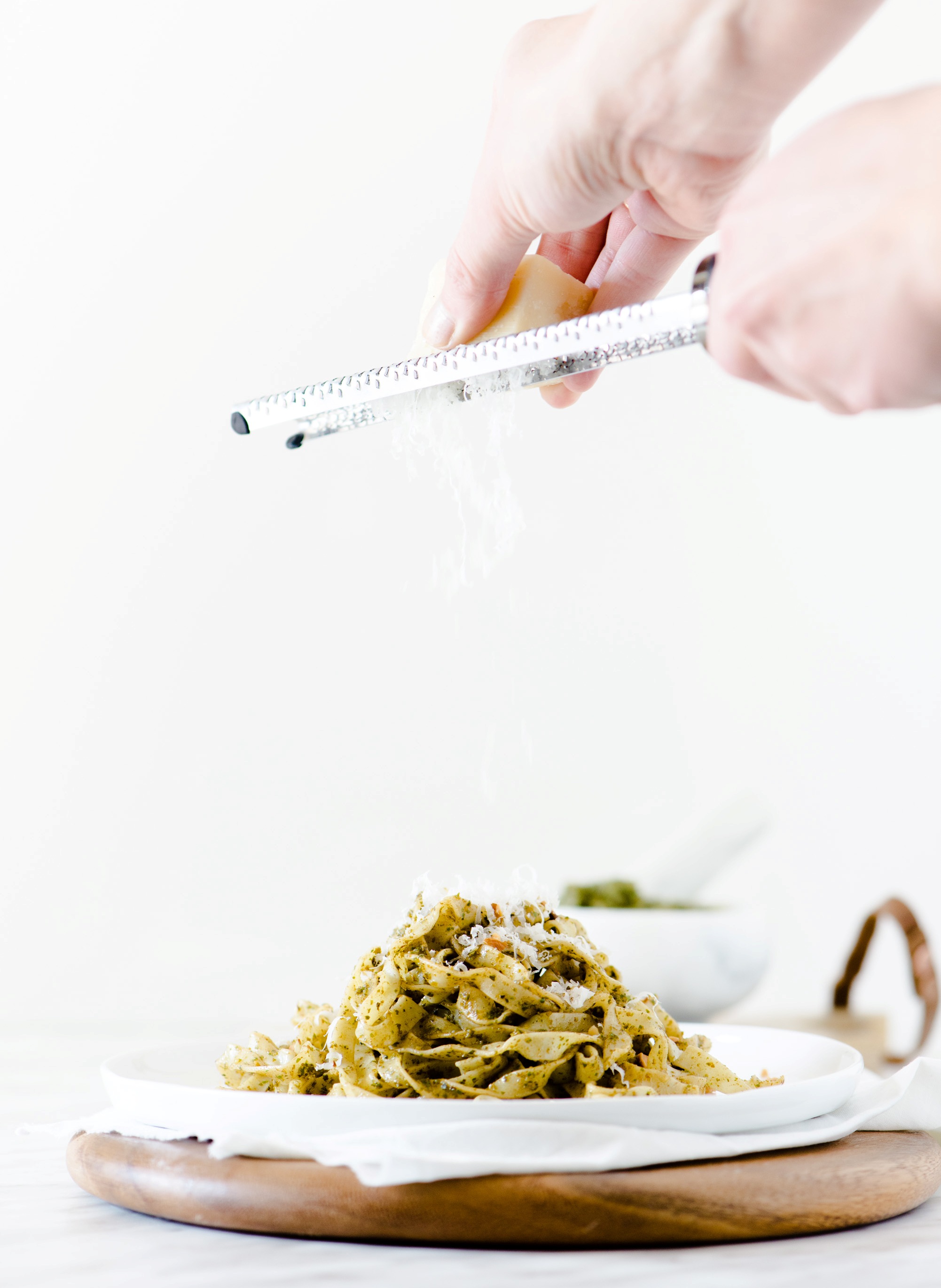Pesto & Fettuccine - Fresh pasta, topped with pesto & almonds.