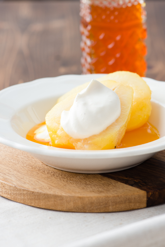 Cardamon & Saffron Poached Pears - These poached pears topped with tea infused whipped cream make a fantastic light dessert.