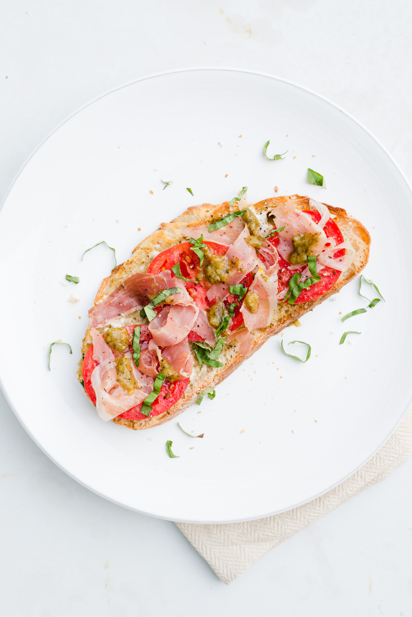 Tomato, Pesto, & Prosciutto Toast - The best way to use up freshly picked tomatoes!