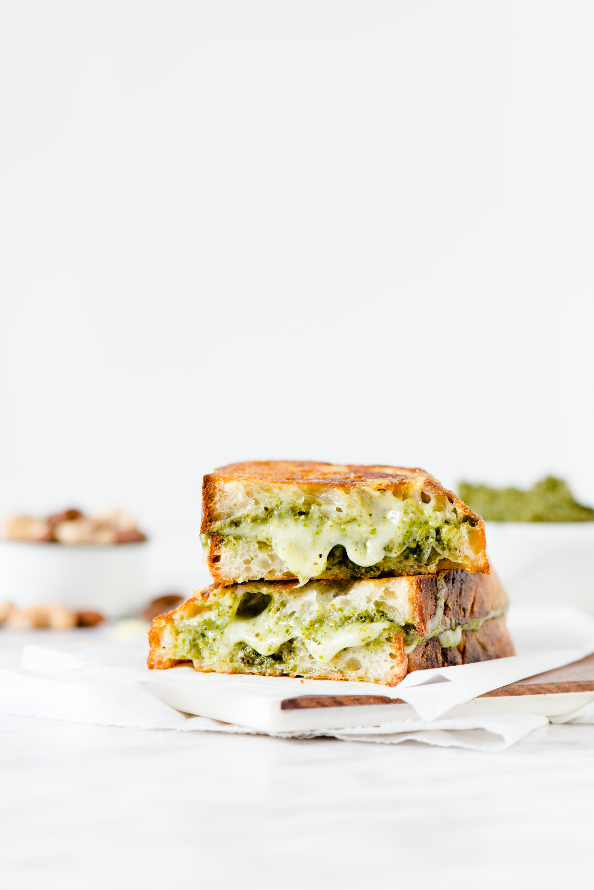 Pesto & Gouda Grilled Cheese - Gooey, herby goodness, sandwiched between two fresh pieces of sourdough bread.